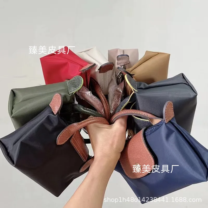 

High quality mini dumplings package 2023 new single handle the cognac color leather laptop bags