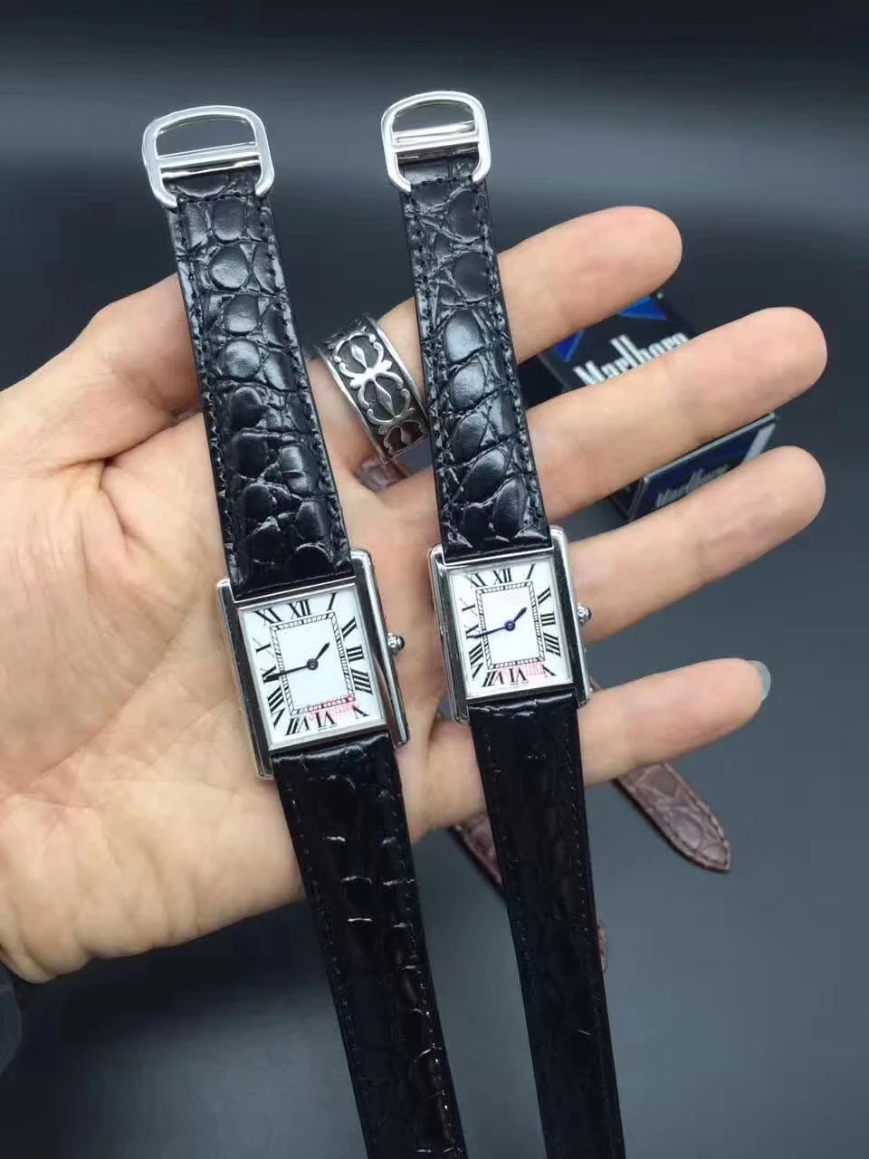 

Quartz Women Silver White Rome dial Black Leather Watch