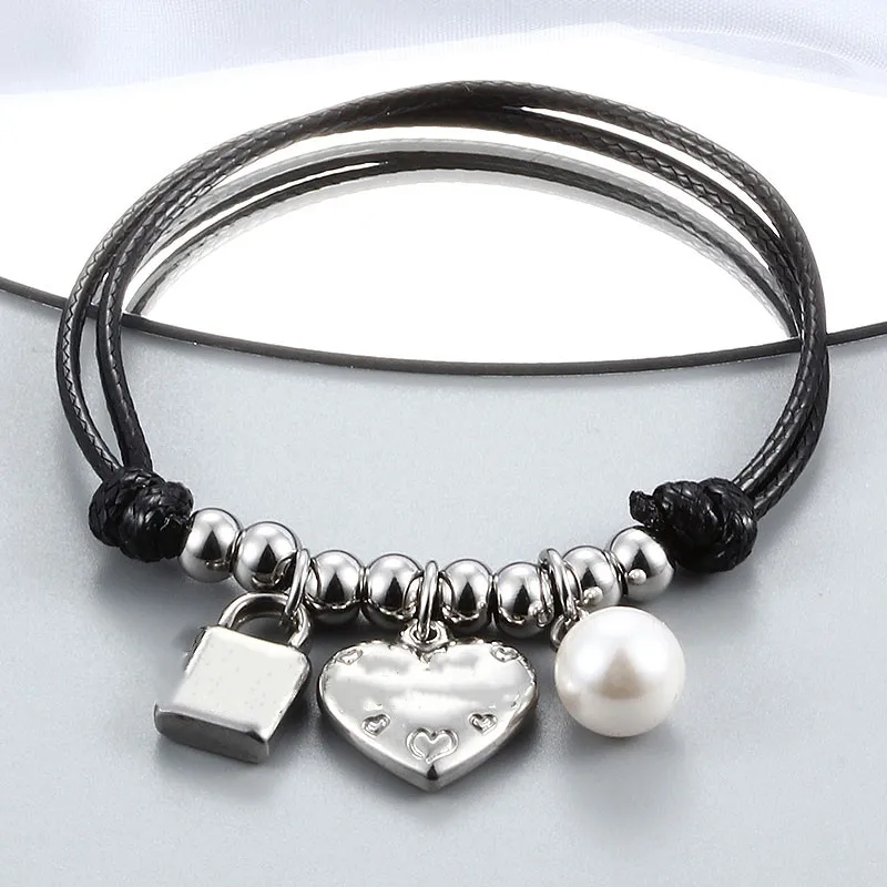 

Горячая Распродажа, женский браслет из титановой стали серебряного цвета с узелком, сердцем, жемчужиной, замком и ключом, 50 плетеных черных ...
