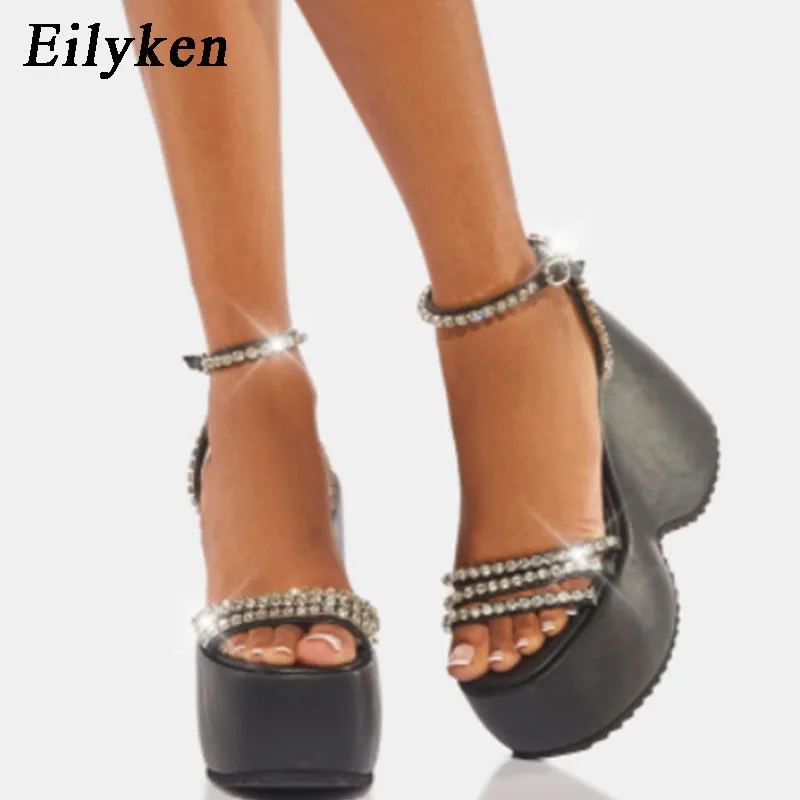 

Eilyken/2022 г.; Прямая поставка; Новинка; Летние женские босоножки на танкетке с ремешком на щиколотке; Модные босоножки на высоком каблуке с крис...