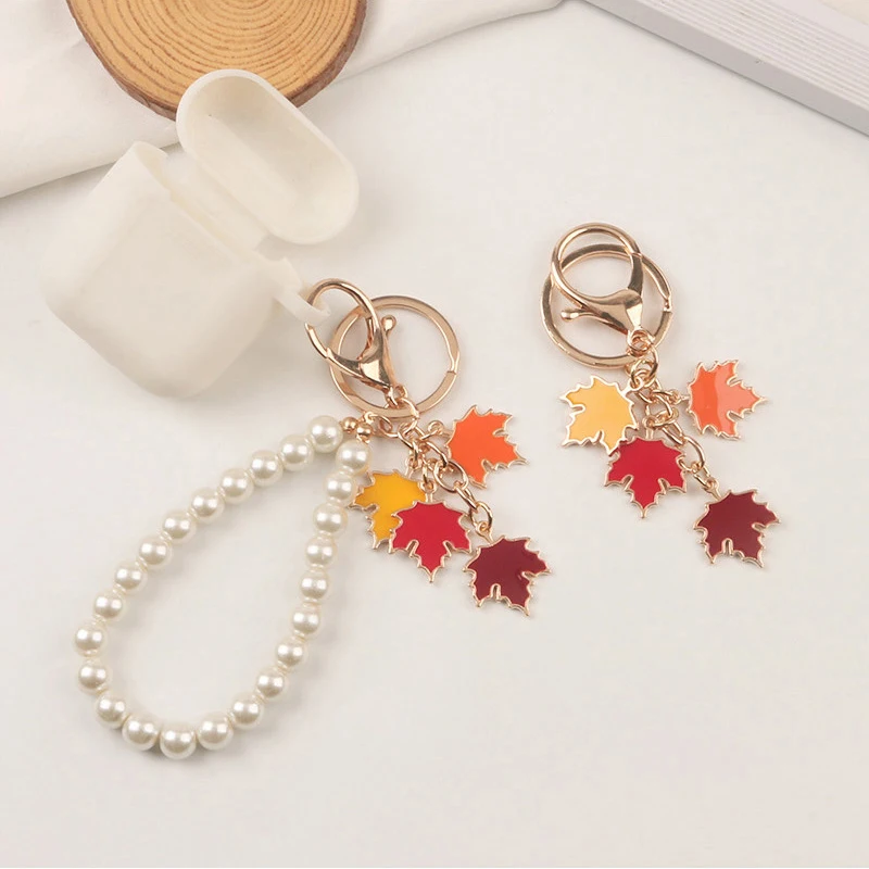

Maple Leaves Pendant Car Keychain Enamel Plant Key Rings Handbag Pendants DIY Creative Women Girls Bag Car Pendant Purse Charms