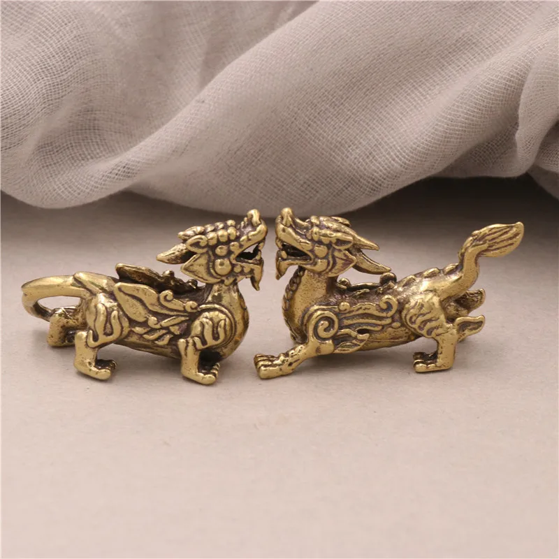 Пара медных статуэток драконов джордж р р мартин пламя и кровь кровь драконов