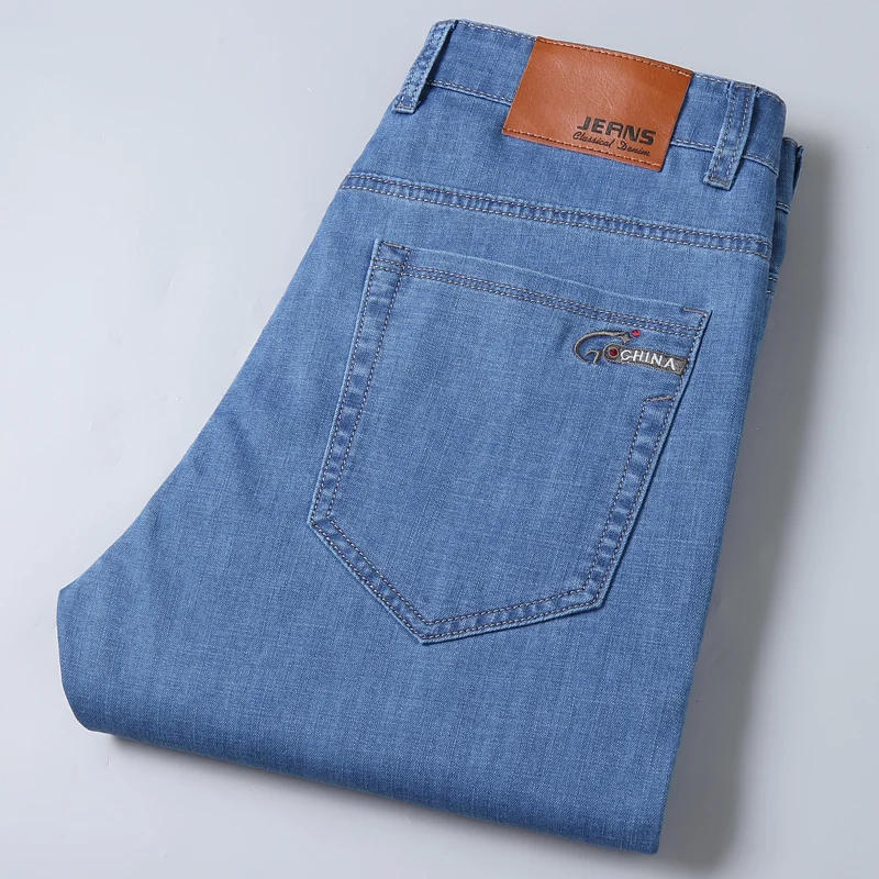 Thoshine Brand Spring Summer Men Thin Jeans Elastic Straight Fit Male Denim Pants Lightweight Stretch Casual Trousers