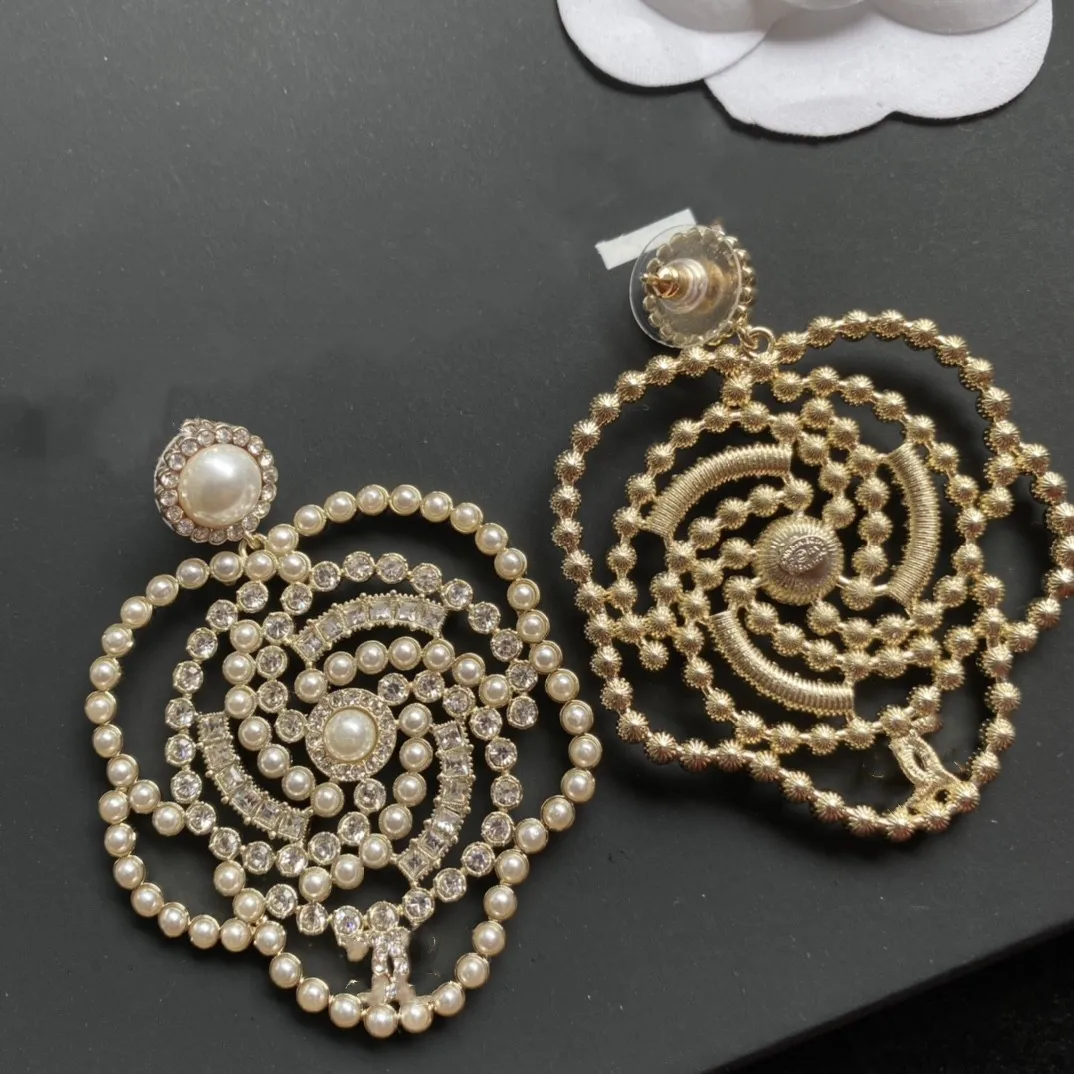 

Star S925 silver needle earrings sweet camellia zircon earrings female celebrity temperament earrings