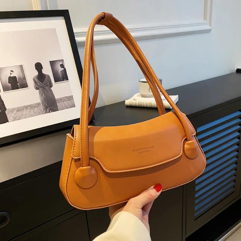 

Высококачественные маленькие дизайнерские сумки для подмышек для женщин 2023 модная кожаная сумка Роскошная брендовая простая женская сумка на плечо