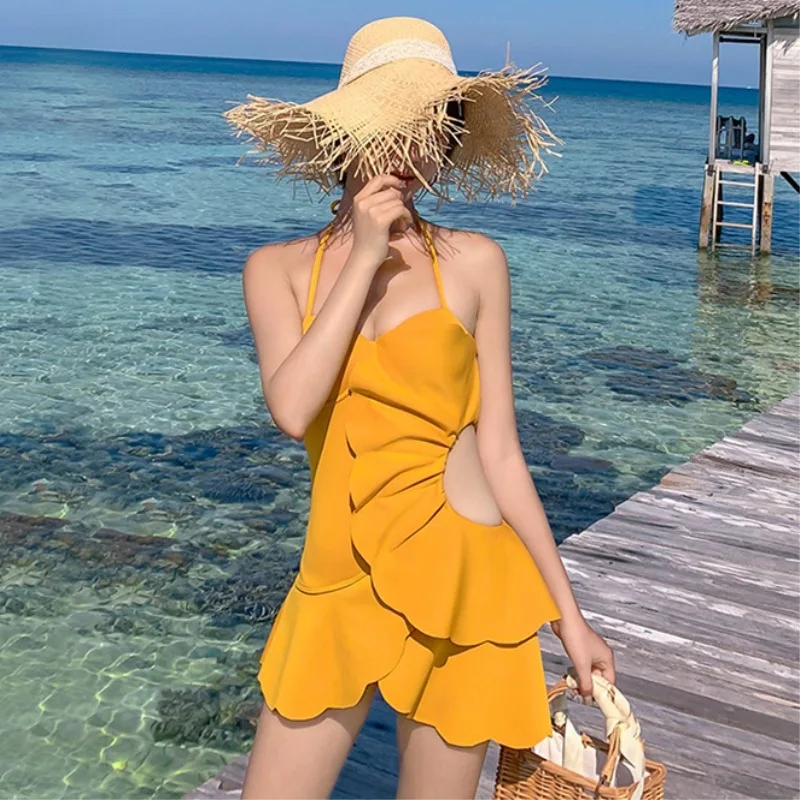 

Korean ginger yellow French hollowed out one-piece small breasts sexy backless thin cover hot spring vacation swimsuit women