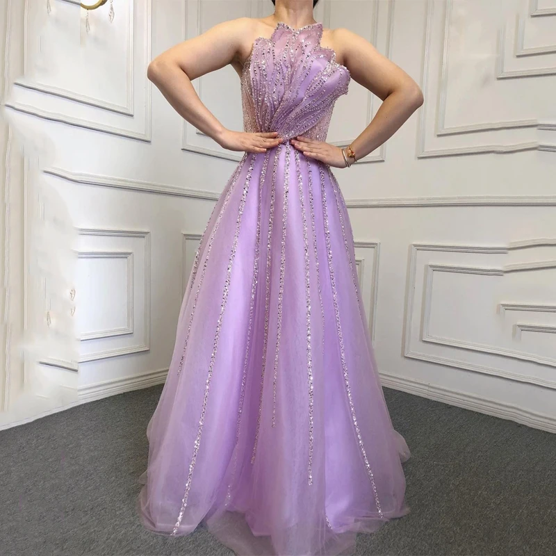 

Pink Long Arabic Evening Dress 2023 Luxury Crystal Ruffled Peplum See Through Dubai Prom Dresses for Women Wedding Party