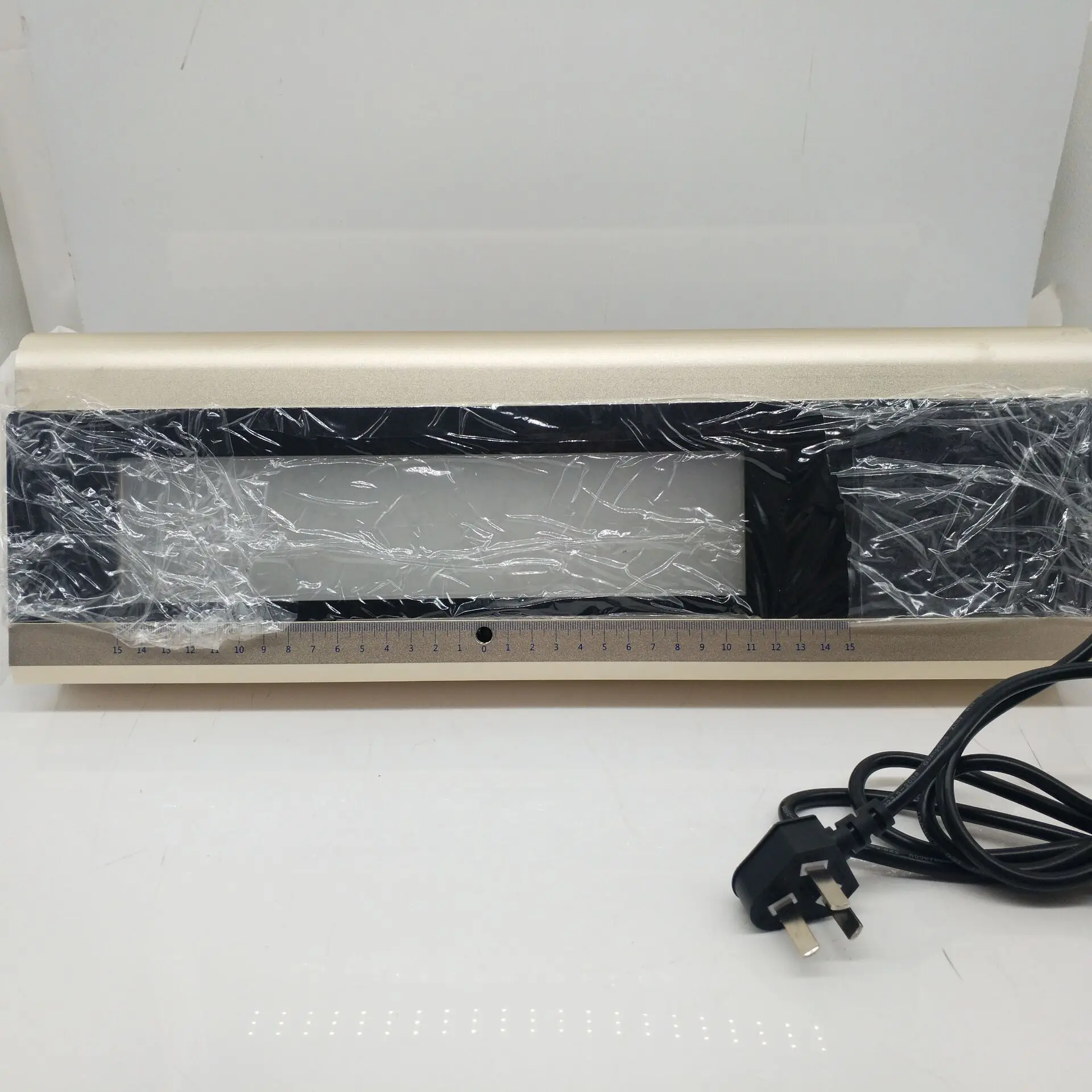 

Портативная лампа для просмотра пленки