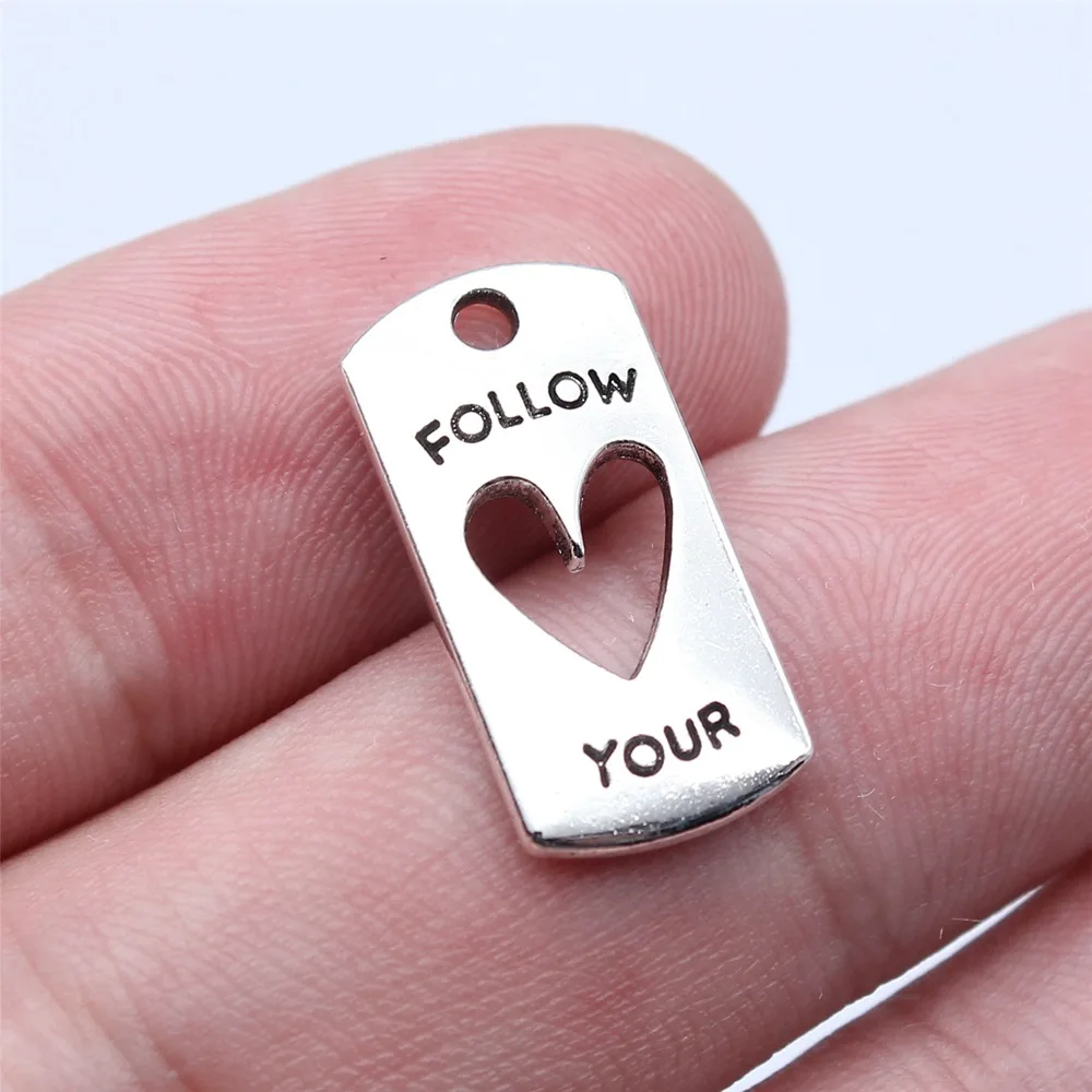 

WYSIWYG 20pcs 10x20mm Antique Silver Color Follow Your Heart Tag Charms Pendant For DIY Jewelry Making