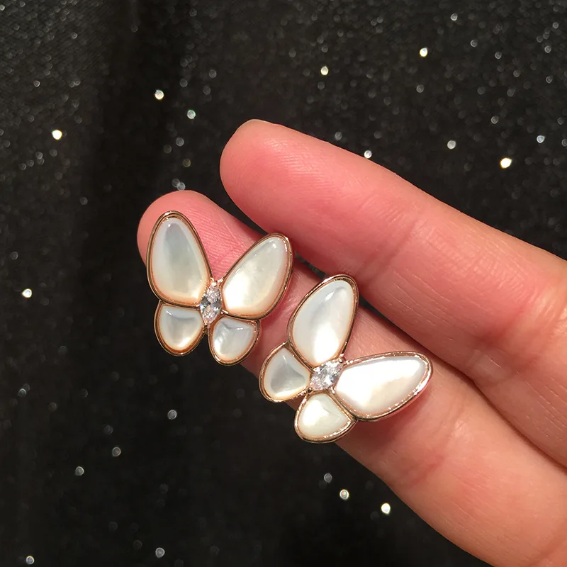 

Butterfly earrings shell female sweet simple atmosphere super fairy earrings temperament S925 silver needle French earrings