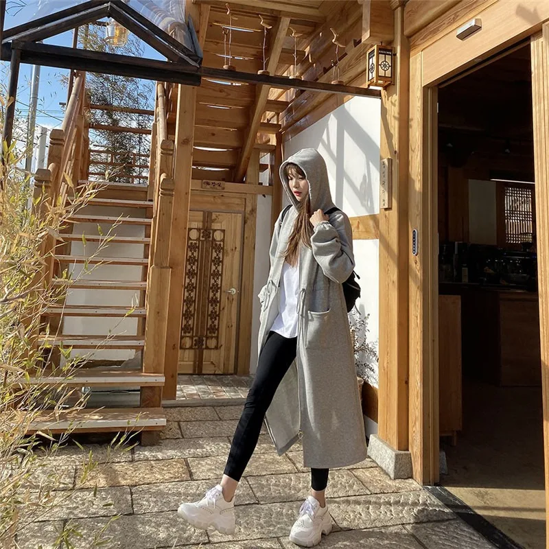 

Autumn and Winter New Fashion Mid Length Over Knee Sweater Zipper Coat Hooded Drawstring Waist Waist Show Thin Trench for Women