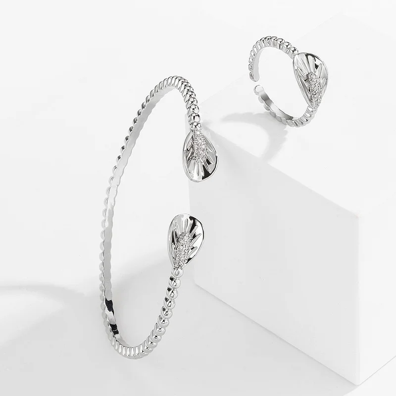 

RAKOL 2022 New Fashion White AAA Cubic Zirconia Plant Leaves Bracelet Adjustable Rings Open Cuff Bangle Jewelry Set for Women