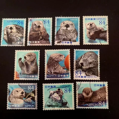 Японские почтовые марки "Морская жизнь", серия 6, морская выдра, 10 шт.