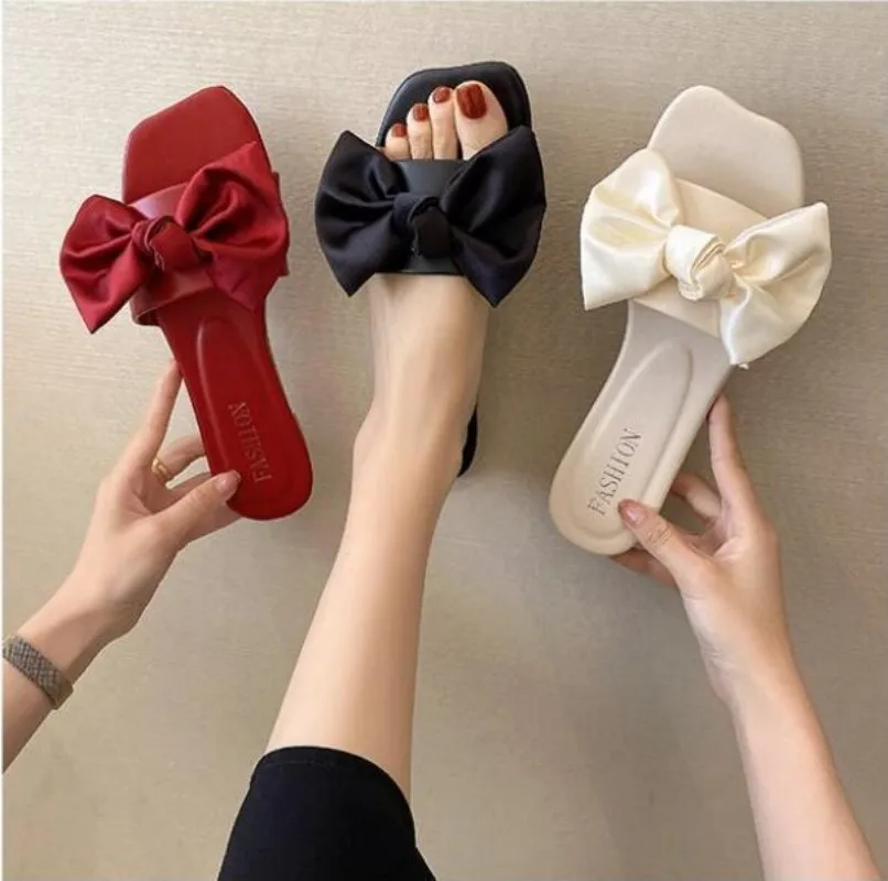 Летние женские тапочки на плоской подошве с бантом-бабочкой слитные удобная