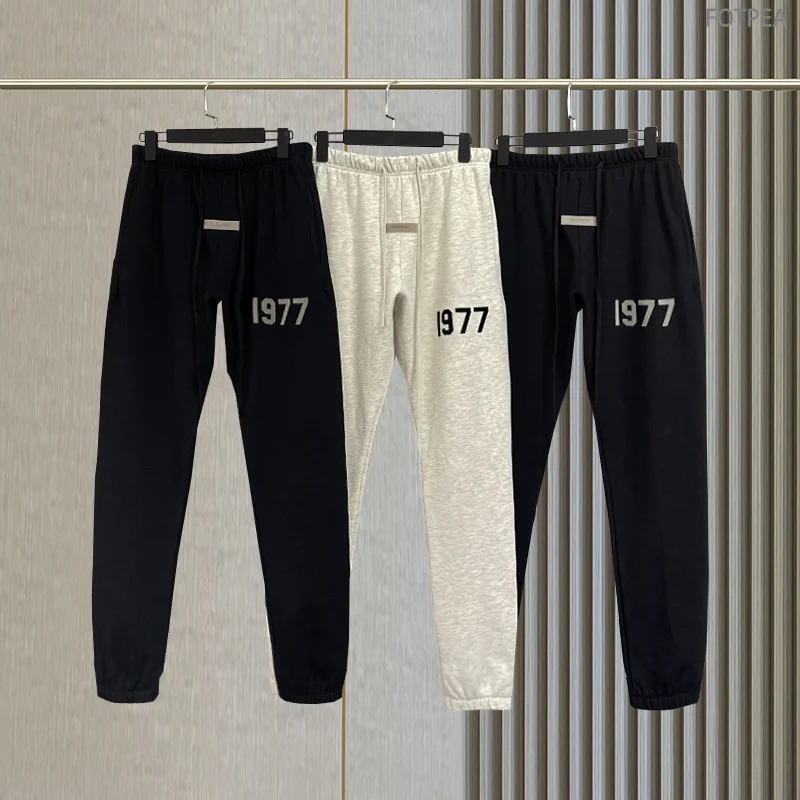 22FW New Essentials 1:1 jogging pants Jerry Lorenzo fashion brand sweatpants flocking logo Hip hop loose Unisex Hoodie pants