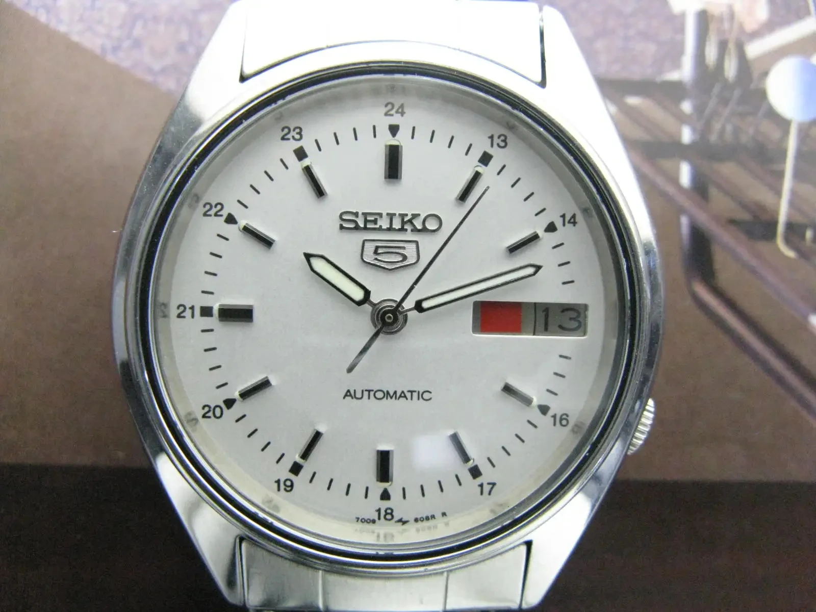 

Японские мужские часы Seiko с двойным календарем, автоматические, среднего размера, б/у, 7009 (римские + английские)