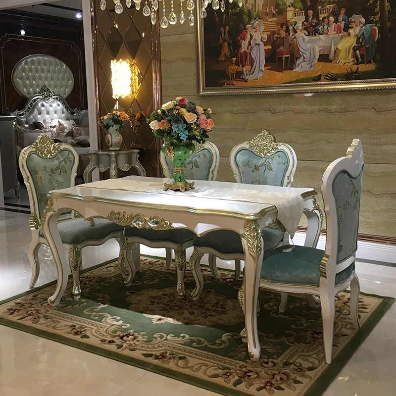 

European style dining table and chair combination solid wood rectangular dining table 6-person dining room carved rice table can