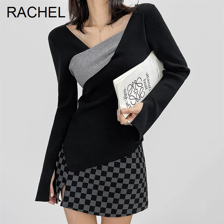 

Свитер с V-образным вырезом и перекрестными вставками