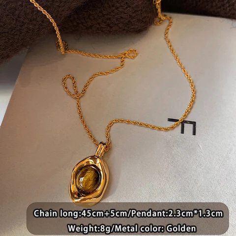 Металлические серьги-гвоздики Таоя тигровый глаз