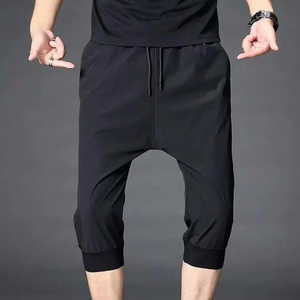 

Men Sweatpants Solid Color Soft Fabric Drawstring Ankle-banded Stretchy Waist Cropped Trousers Men Sweatpants Daily Clothes