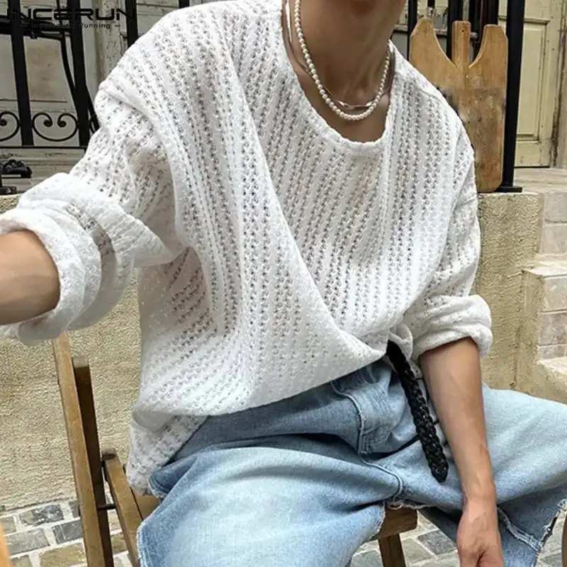 

Футболка мужская однотонная с круглым вырезом и длинным рукавом