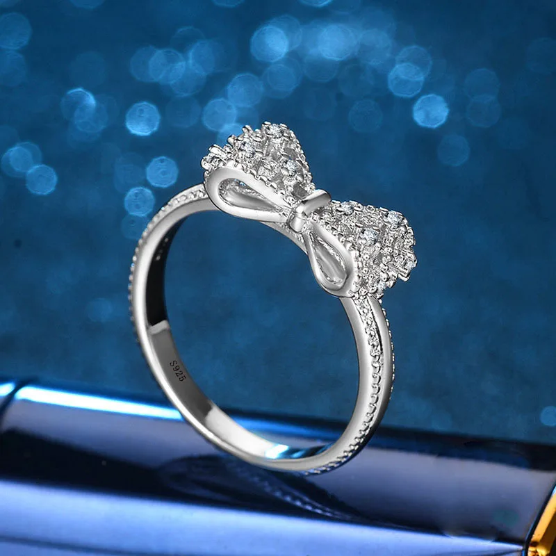 

Sparkling AAA 1.2ct Zirconia Crystal Bowknot Design Silver color filled Wedding Rings for women Bijoux Fashion Engagement Ring