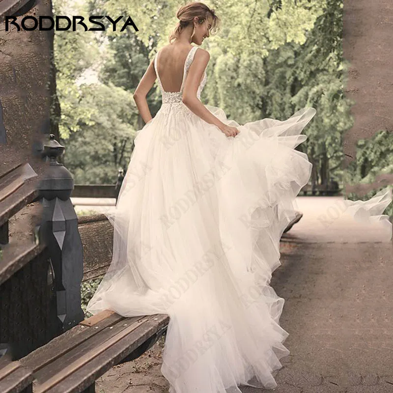 Фото Фатиновые Свадебные платья на бретельках RODDRSYA Spagehtti без рукавов с аппликацией трапециевидного силуэта свадебное платье с открытой спиной с V-образным вырезом женское платье на заказ Spagehtti Straps Tulle Brida №2