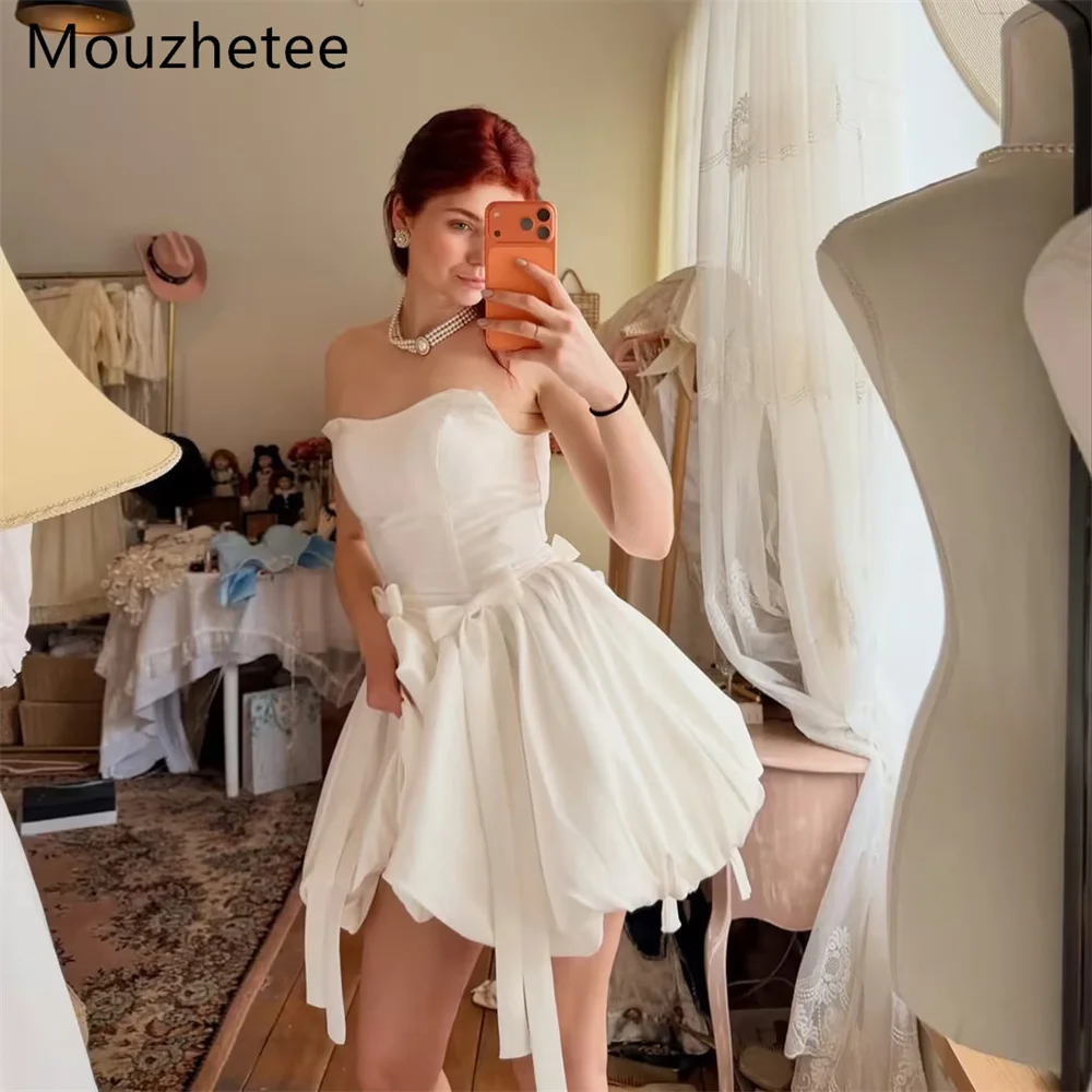 Фото Элегантное свадебное платье Mouzhetee А-силуэта без бретелек и рукавов, мини, с бантом, простое атласное платье для невесты, на заказ, 2026 №1