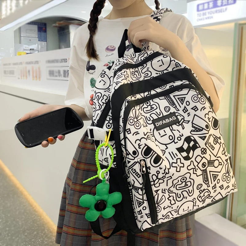 

JOYPESSIE Fashion Cute Graffiti Student Schoolbag for Girls Teenager Bookbag Kawaii Waterproof Women Backpack Travel Mochila
