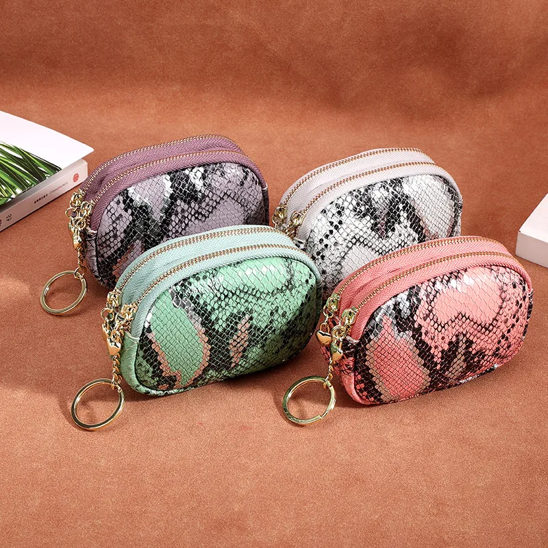 Вместительные двойные молнии из натуральной кожи с змеиным узором |