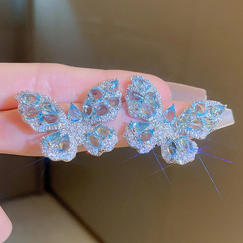 

New Blue Zircon Crystal Bowknot Stud Earrings Women Heart Butterfly Luxury Earrings Girls New Year Festival Jewelry 2023