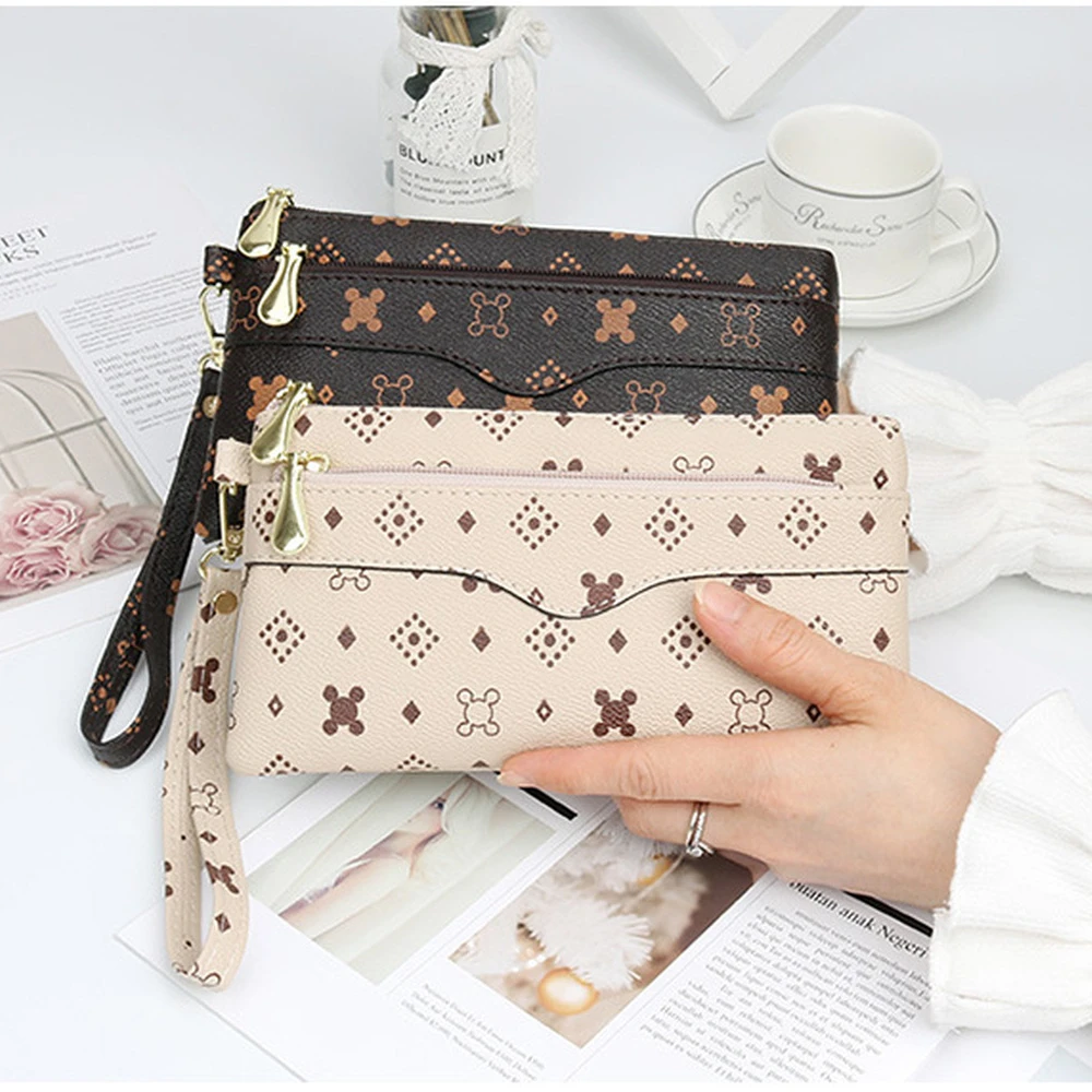 

Новинка 2022, женский кожаный тонкий длинный кошелек на молнии, Женский кошелек, клатч, тонкий держатель для телефона с ремешком на руку и моне...