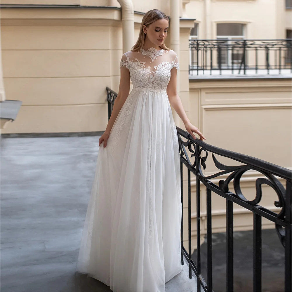 

Boho Lace Applique Cap Sleeves Wedding Dresses Illusion A-Line Princess Tulle Floor Length Bridal Gowns Button With Pearls Back