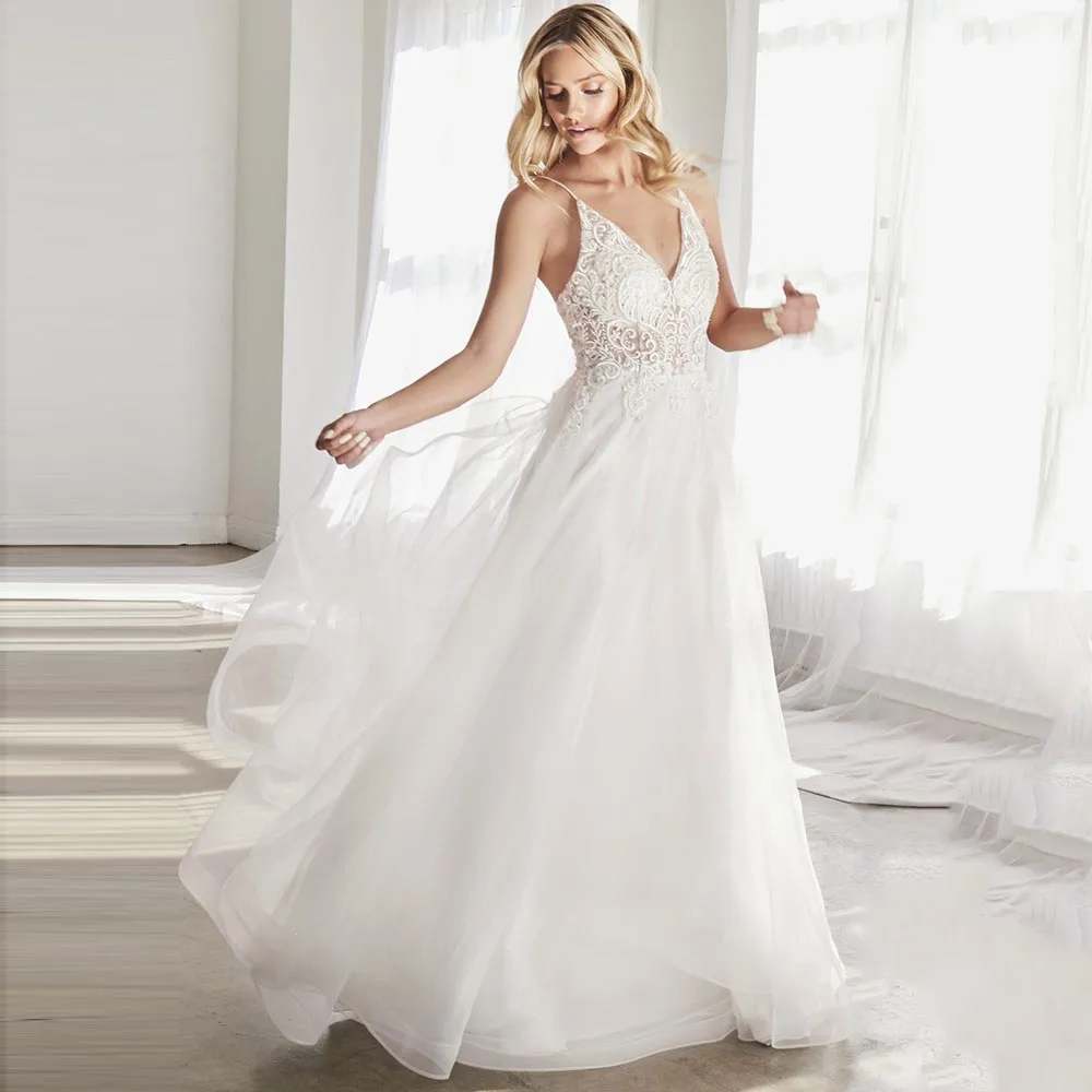 

V Neck A Line Boho Wedding Dresses Spaghetti Straps Lace Princess Bridal Gowns Beaded Sweep Train Beach Robe De Mariée