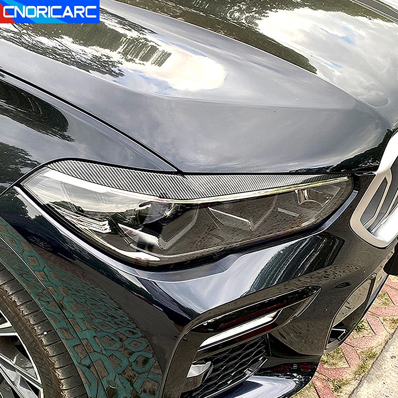 

Carbon Fiber Black Auto Front Headlight Eyelid Eyebrow Trims Sticker For BMW X5 G05 X6 G06 2019-2022 Car Exterior Accessories