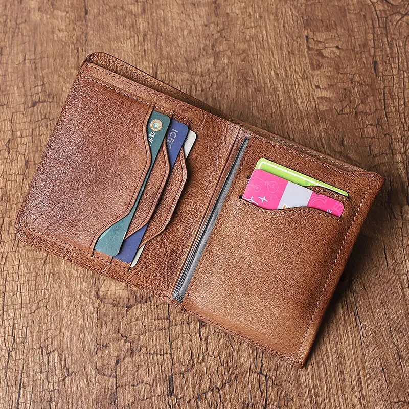 Retro fashion high quality natural real leather ladies short coin purse summer hot sale men anti-theft business card wallet