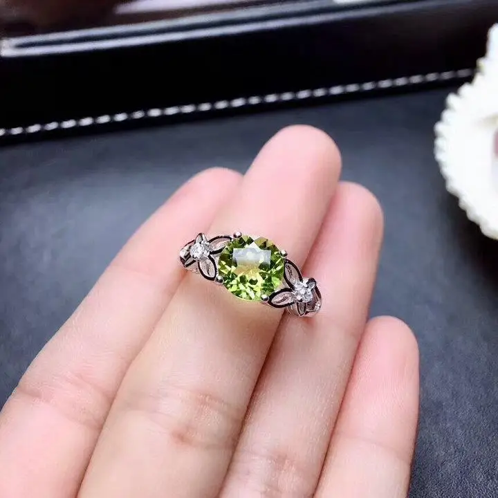 

New natural peridot ring female s925 sterling silver Japanese and Korean simple emerald crystal ring open temperament ring