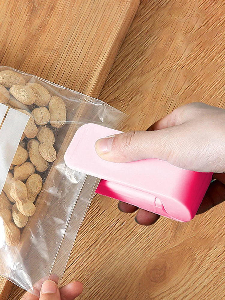 

Portable Mini Sealing Machine Food Plastic-Envelop Machine Snack Plastic Bag Sealing Machine Household Manual Heat Sealing Machi