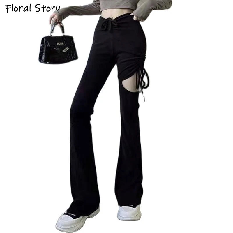 Женские расклешенные брюки с V-образным вырезом однотонные черные длинные в