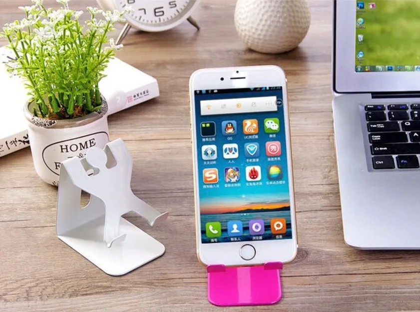 

Mobile phone and Tablet Pc charging stand human shaped