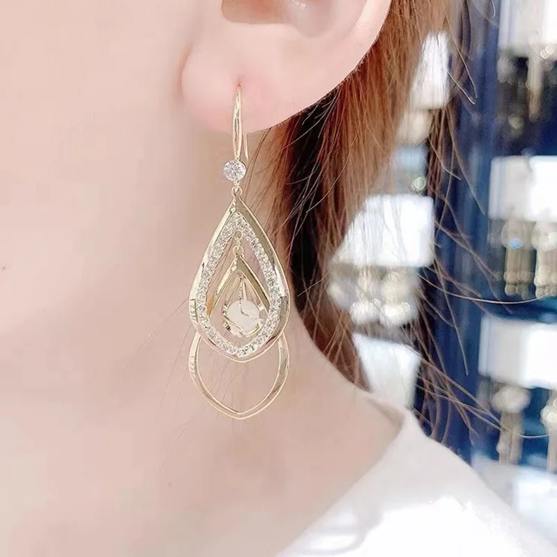 

New Cat's Eye Earrings, Feminine Temperament, Fashionable, Long Diamond-shaped Advanced Sense Earrings