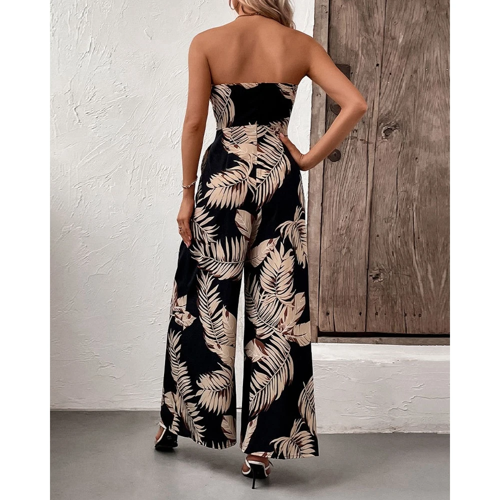 Женский комбинезон с тропическим принтом элегантный черный завязкой на груди и