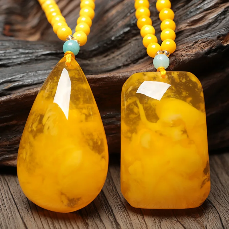 

Пони медовый воск подвеска Капля воды куриное масло желтый старый медовый воск Wushi бренд золотой витой свитер Женская медовая цепочка-ожере...