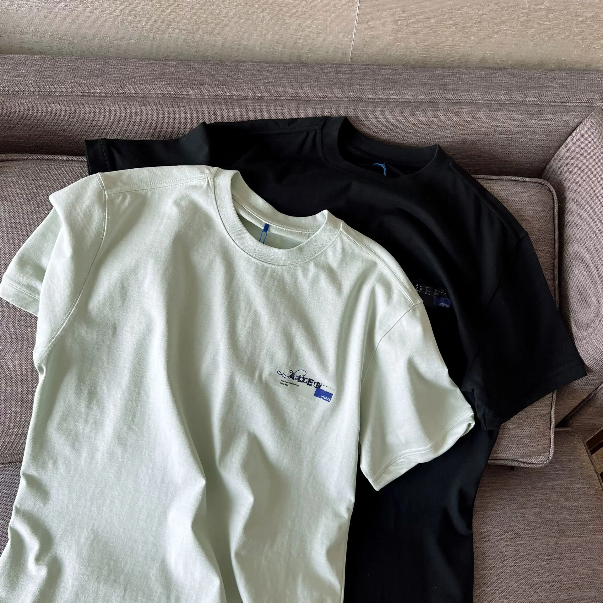 

Ader 2022 summer new fashion brand smeared offset letters loose round neck short sleeve T-shirt for men and women