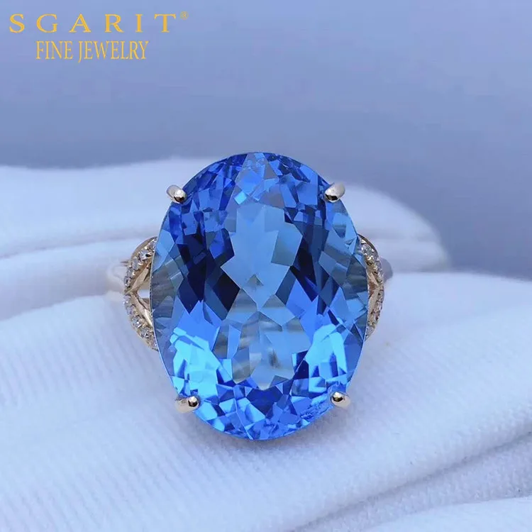 

Женское кольцо из 18-каратного золота с натуральным голубым топазом 13,7 карата