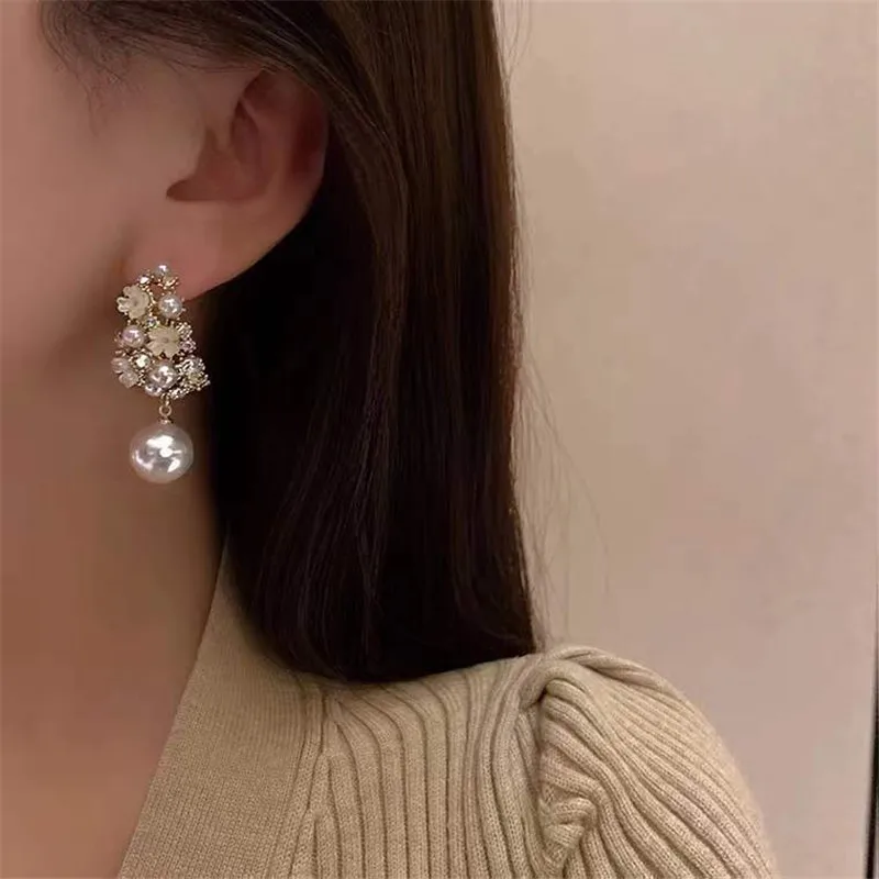 

New Arrival Luxury Simulated Pearl Vintage Palace Geometric Simple Micro Inlaid Hollow Flower Zircon Dangle Earrings For Women