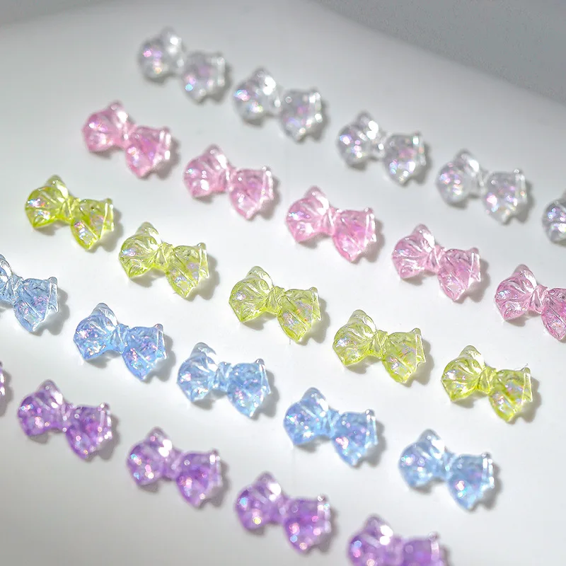 

50pcs Exqusitive Ribbon Bows Nail Charm 3D Ice Transparent Summer Nail Art Decorations DIY Nails Supplies Accessories 7.5mmx10mm