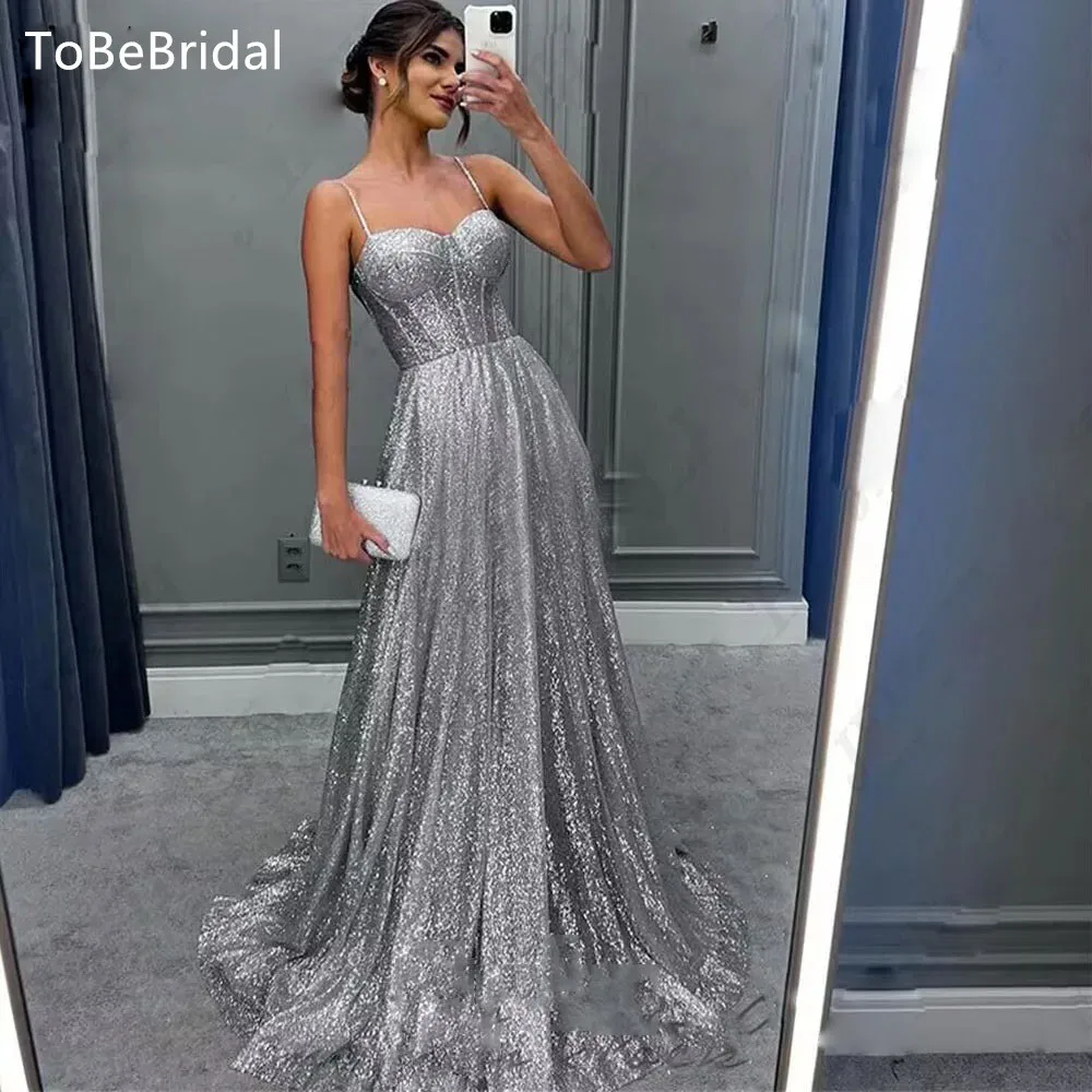 Серебряное блестящее вечернее платье трапециевидной формы по индивидуальному