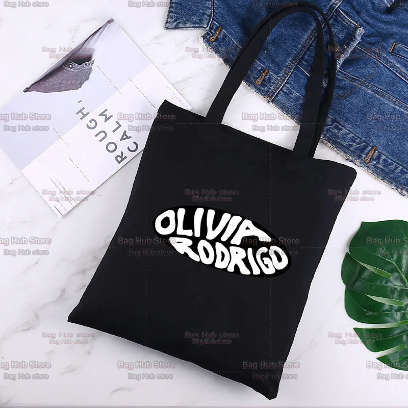 

Olivia Rodrigo Sweet Music Star Cartoon Shoulder Bag Black Canvas Bag Harajuku Shopper Bag Fashion Casual Summer Shoulder Bags