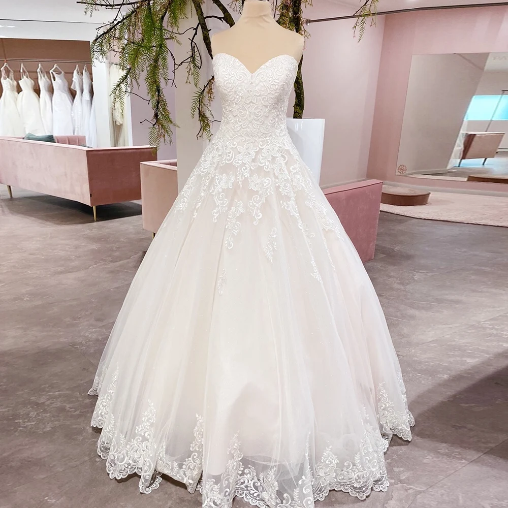 

Gorgeous Wedding Dresses 2022 Sweetheart Applique Ivory Elegant Bride Dress Boho Sleeveless Tulle Custom Long Sexy Party Gowns